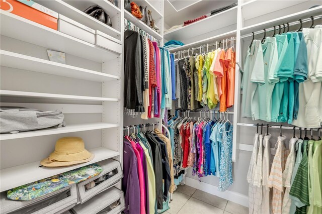 660 Mosaic Blvd, Daytona Beach, FL 32124 - walk in closet featuring tile patterned flooring