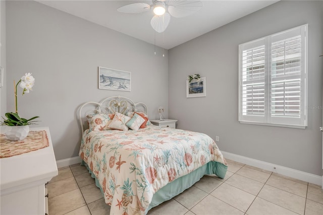 660 Mosaic Blvd, Daytona Beach, FL 32124 - bedroom with light tile patterned floors, baseboards, and ceiling fan