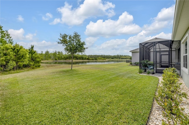 660 Mosaic Blvd, Daytona Beach, FL 32124 - view of green lawn with a water view and a lanai