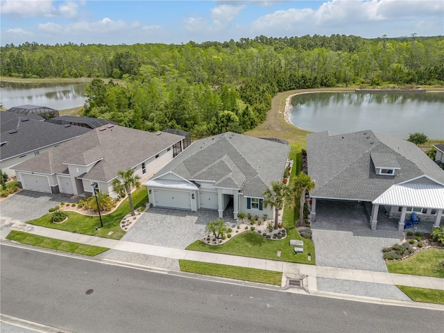 660 Mosaic Blvd, Daytona Beach, FL 32124 - aerial view of property and surrounding area featuring a heavily wooded area and a nearby body of water