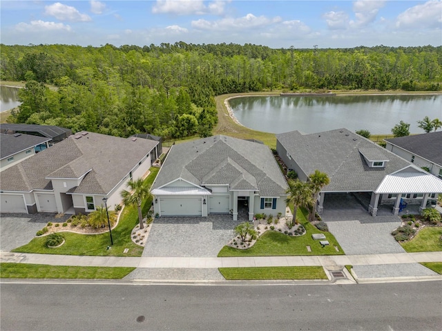 660 Mosaic Blvd, Daytona Beach, FL 32124 - aerial perspective of suburban area with a large body of water and a heavily wooded area