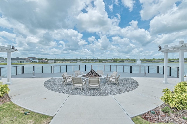 660 Mosaic Blvd, Daytona Beach, FL 32124 - view of patio featuring a fire pit and a water view