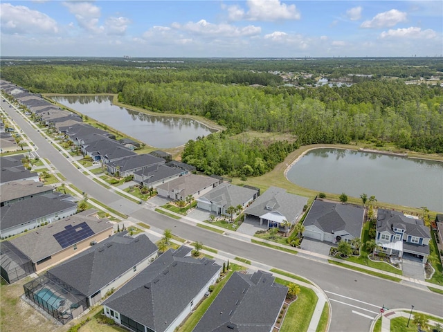 660 Mosaic Blvd, Daytona Beach, FL 32124 - aerial view of residential area featuring a heavily wooded area and a large body of water