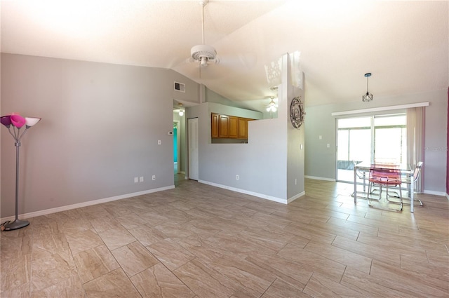 unfurnished living room with visible vents, a ceiling fan, vaulted ceiling, and baseboards