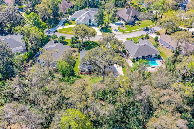 birds eye view of property with a residential view