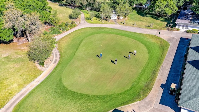 drone / aerial view featuring view of golf course