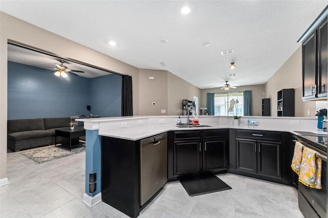 1079 Quaker Ridge Ln, Davenport, FL 33896 - kitchen with open floor plan, stainless steel appliances, a ceiling fan, and a sink