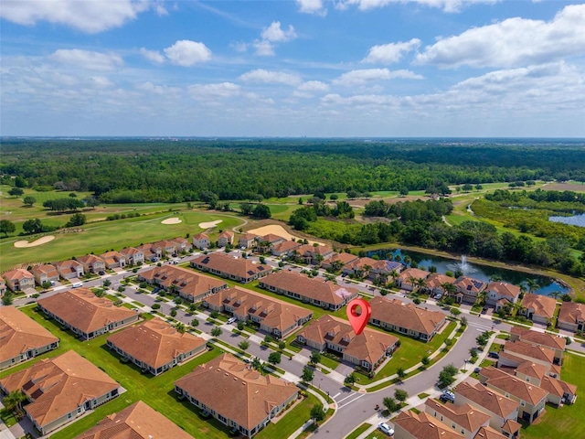 1079 Quaker Ridge Ln, Davenport, FL 33896 - bird's eye view featuring golf course view, a residential view, a water view, and a view of trees