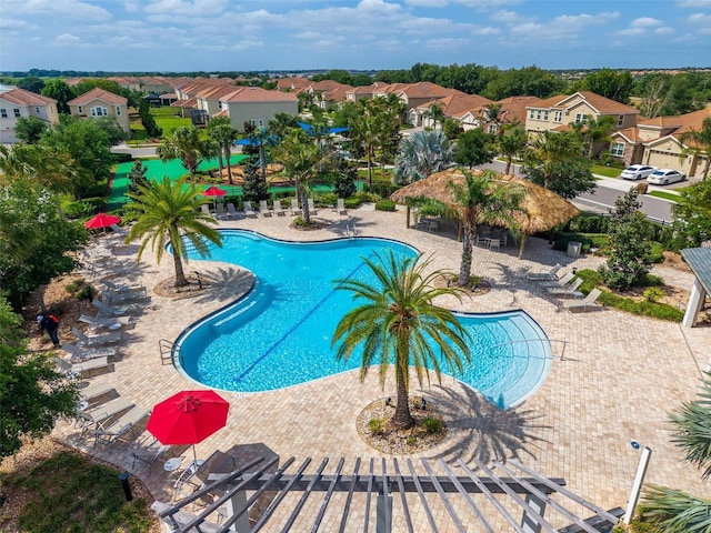 1079 Quaker Ridge Ln, Davenport, FL 33896 - pool featuring a patio and a residential view