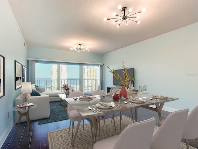 2 Oceans W Blvd Unit 1007, Daytona Beach, FL 32118 - dining space with a chandelier, wood finished floors, and baseboards