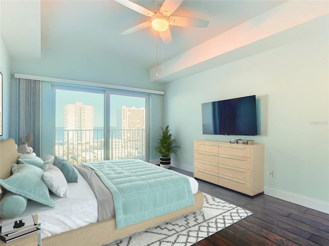 2 Oceans W Blvd Unit 1007, Daytona Beach, FL 32118 - bedroom with baseboards, wood-type flooring, a ceiling fan, and vaulted ceiling