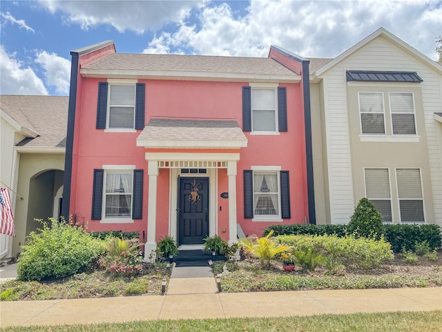 103 Manor View Ln, Deland, FL 32724 - view of front facade featuring roof with shingles and stucco siding