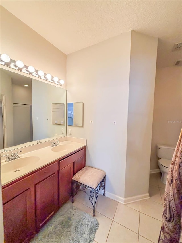 103 Manor View Ln, Deland, FL 32724 - bathroom featuring tile patterned flooring, a sink, and toilet