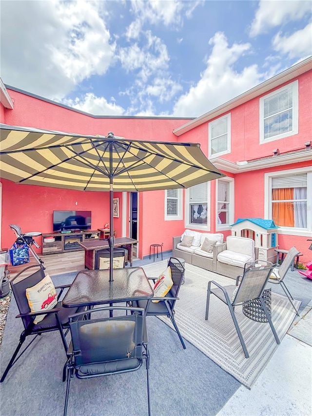 103 Manor View Ln, Deland, FL 32724 - view of patio with outdoor dining area and outdoor lounge area