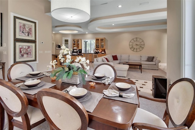 dining space featuring carpet and recessed lighting