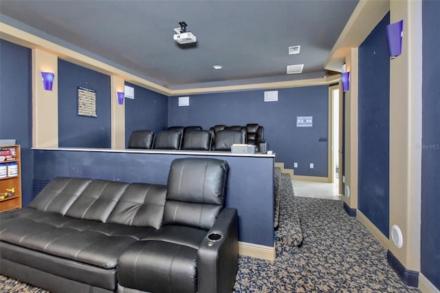 carpeted cinema with baseboards