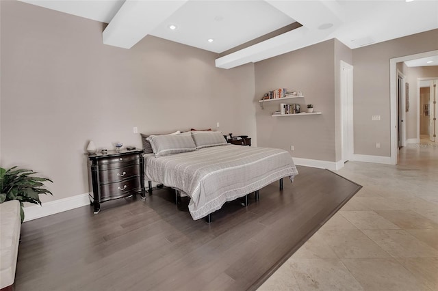 bedroom featuring baseboards, recessed lighting, and beamed ceiling