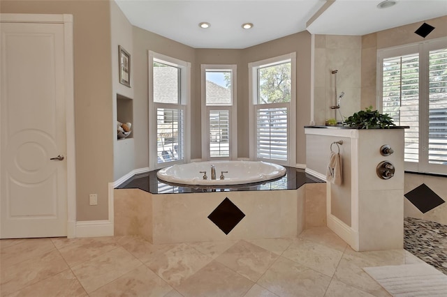 bathroom with a walk in shower, a garden tub, tile patterned flooring, plenty of natural light, and recessed lighting