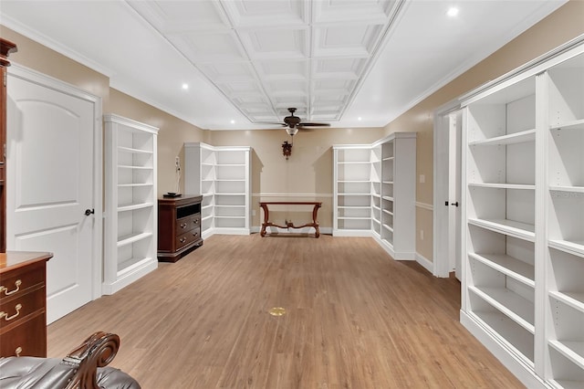 unfurnished living room with ceiling fan, light wood-type flooring, and baseboards