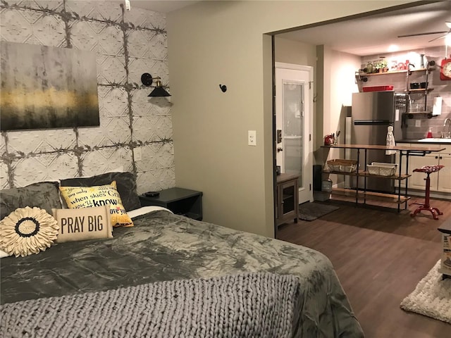 bedroom with wood finished floors
