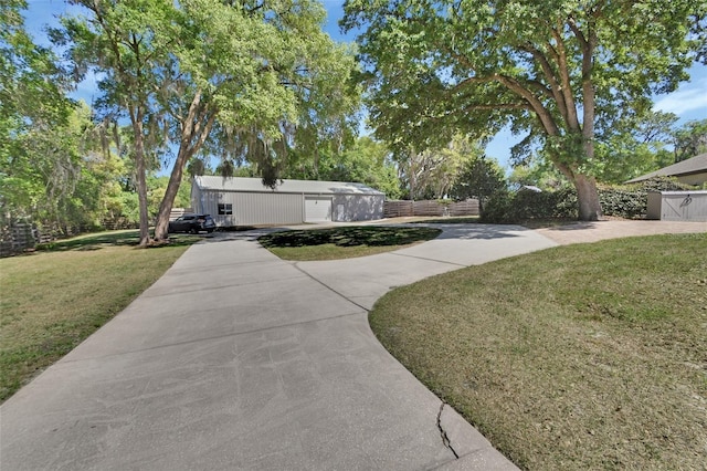 view of front of home with concrete driveway