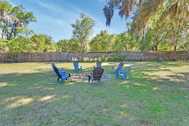 view of yard featuring a fire pit