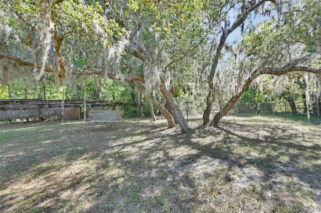 view of yard featuring fence