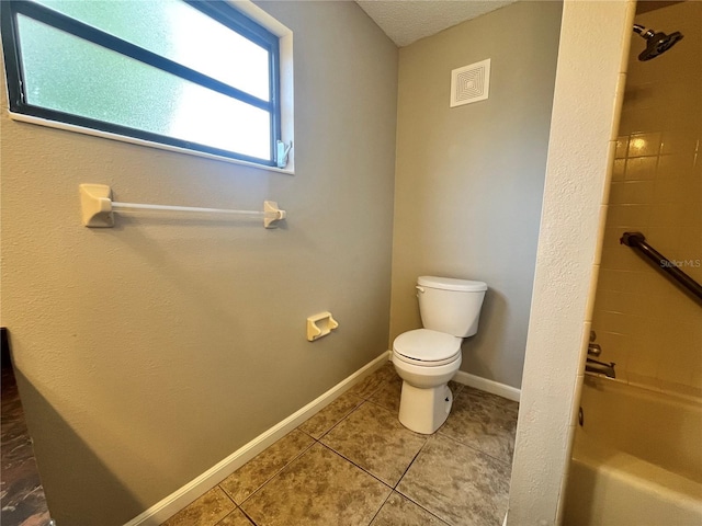 full bathroom with tile patterned flooring, toilet, shower / tub combination, baseboards, and visible vents