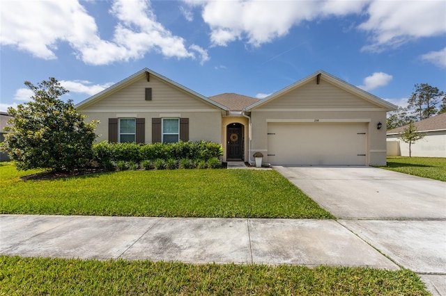 single story home with an attached garage, driveway, a front yard, and stucco siding