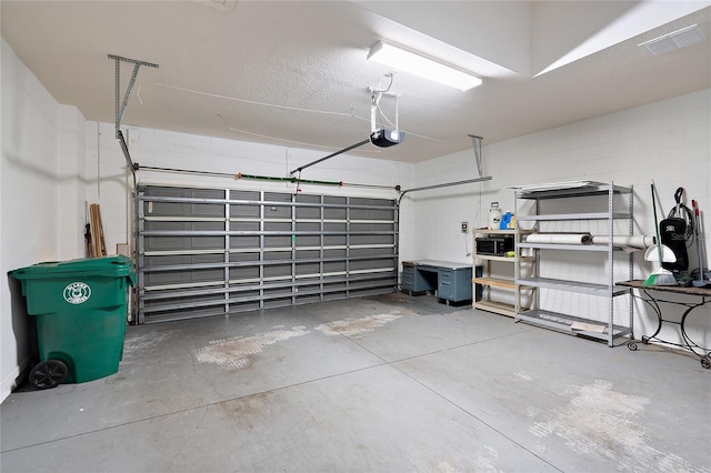 417 Victoria Hills Dr, Deland, FL 32724 - garage featuring a garage door opener