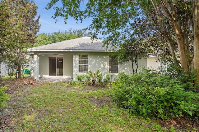 417 Victoria Hills Dr, Deland, FL 32724 - back of house with stucco siding, ceiling fan, and a patio