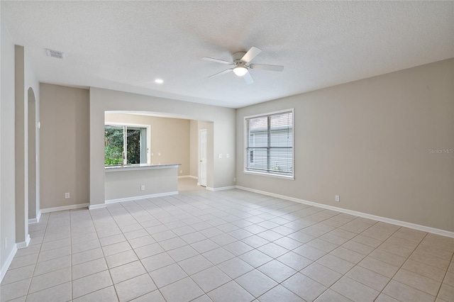 417 Victoria Hills Dr, Deland, FL 32724 - spare room featuring ceiling fan, healthy amount of natural light, a textured ceiling, light tile patterned floors, and recessed lighting