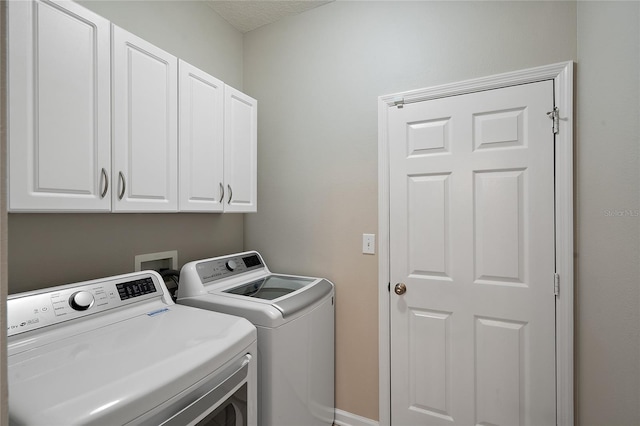 417 Victoria Hills Dr, Deland, FL 32724 - laundry area featuring washing machine and clothes dryer and cabinet space