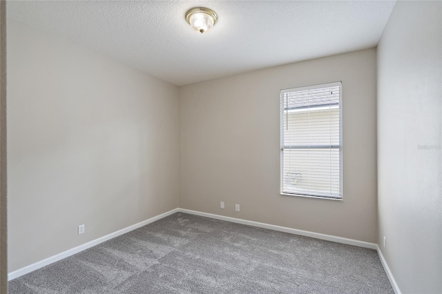 417 Victoria Hills Dr, Deland, FL 32724 - carpeted spare room with baseboards and a textured ceiling