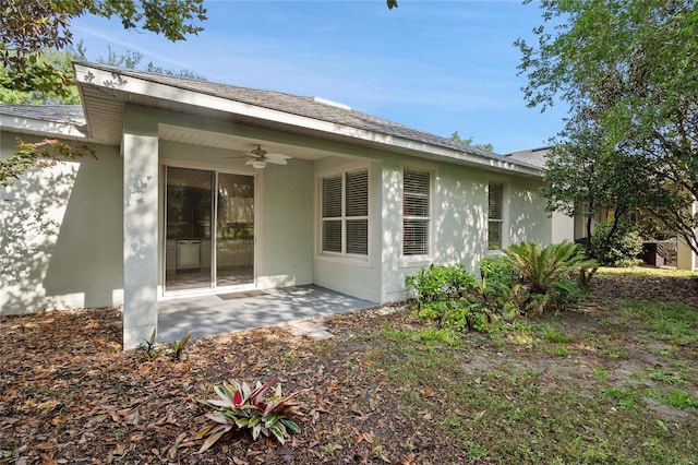 417 Victoria Hills Dr, Deland, FL 32724 - rear view of property featuring a ceiling fan, stucco siding, and a patio area