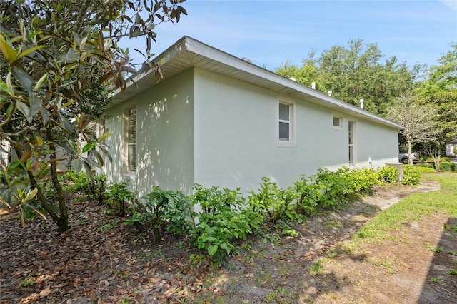 417 Victoria Hills Dr, Deland, FL 32724 - view of property exterior featuring stucco siding