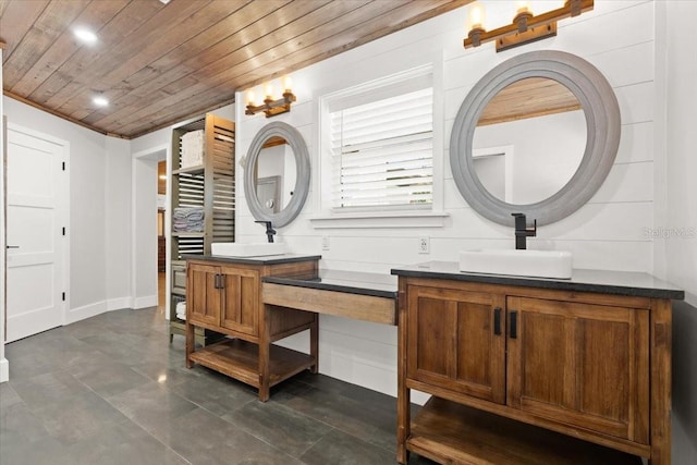 full bathroom featuring wood ceiling, two vanities, and a sink