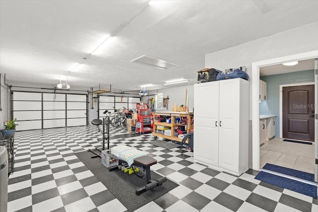 garage featuring a garage door opener