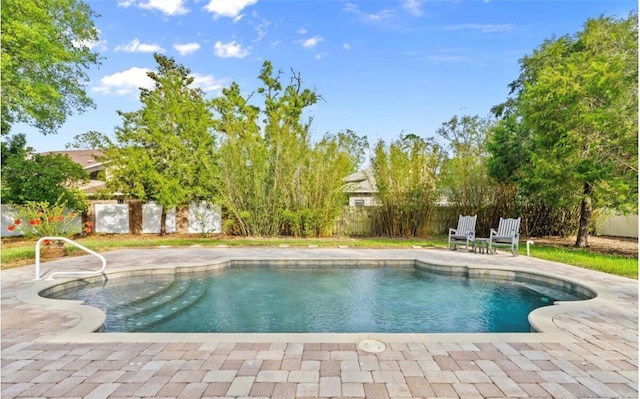 28 Shadowcreek Way, Ormond Beach, FL 32174 - view of pool with a fenced backyard, a fenced in pool, and a patio area