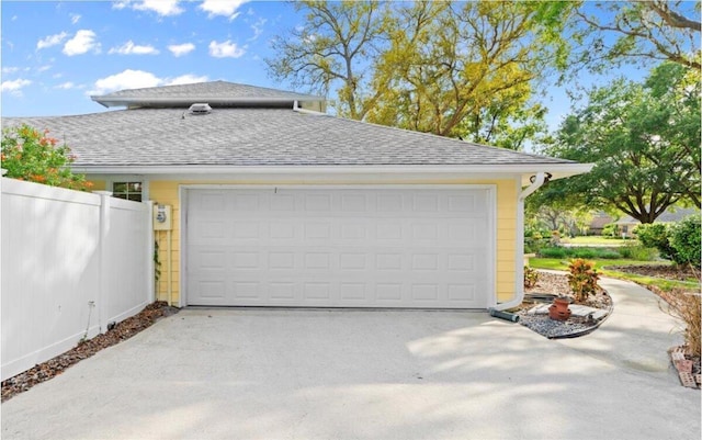 28 Shadowcreek Way, Ormond Beach, FL 32174 - garage with fence and concrete driveway