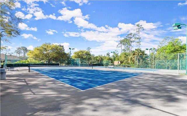 28 Shadowcreek Way, Ormond Beach, FL 32174 - view of tennis court featuring fence