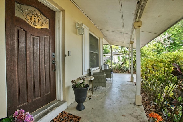 entrance to property with covered porch