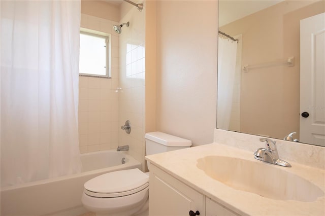 full bath featuring shower / tub combo with curtain, toilet, and vanity