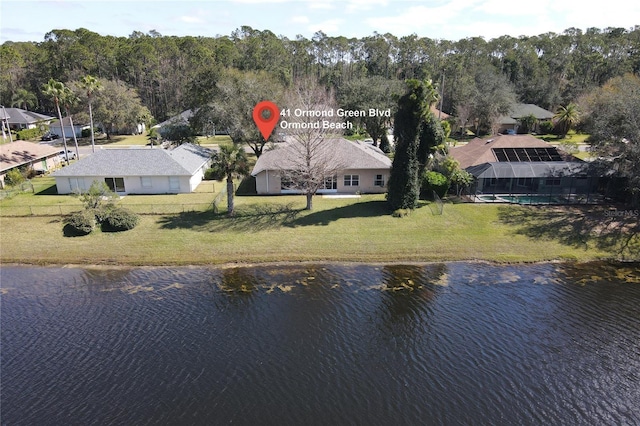 bird's eye view featuring a residential view and a water view