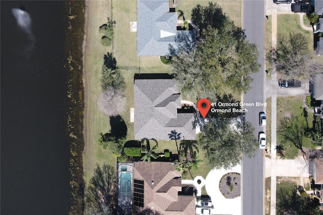 birds eye view of property with a residential view