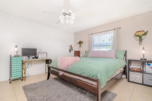 1343 Rocky Rd, Kissimmee, FL 34744 - bedroom with tile patterned floors, baseboards, and a ceiling fan