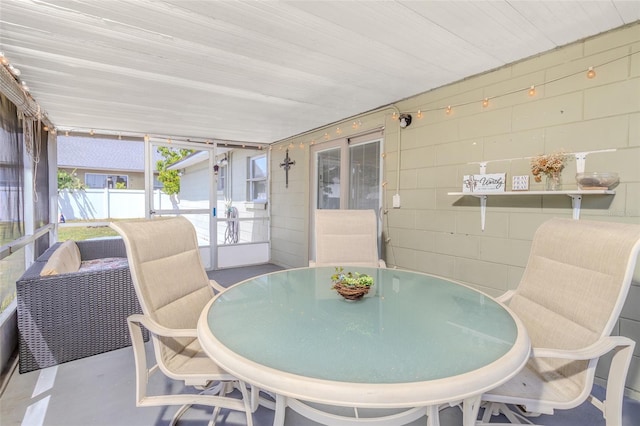 1343 Rocky Rd, Kissimmee, FL 34744 - sunroom / solarium featuring outdoor dining space