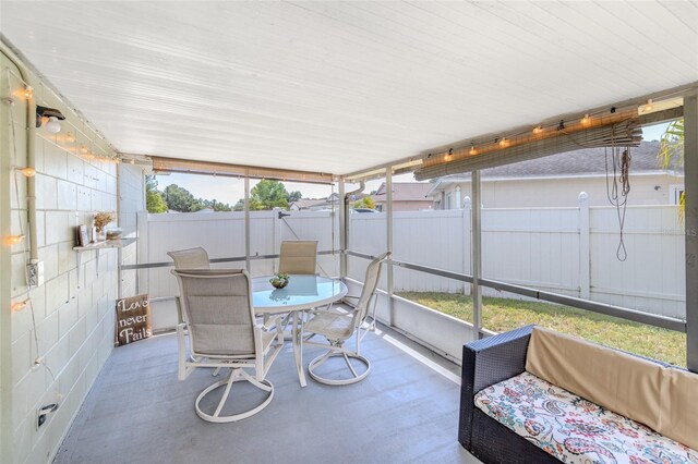 1343 Rocky Rd, Kissimmee, FL 34744 - sunroom / solarium with outdoor dining area