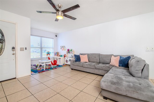 1343 Rocky Rd, Kissimmee, FL 34744 - living area featuring ceiling fan and light tile patterned flooring