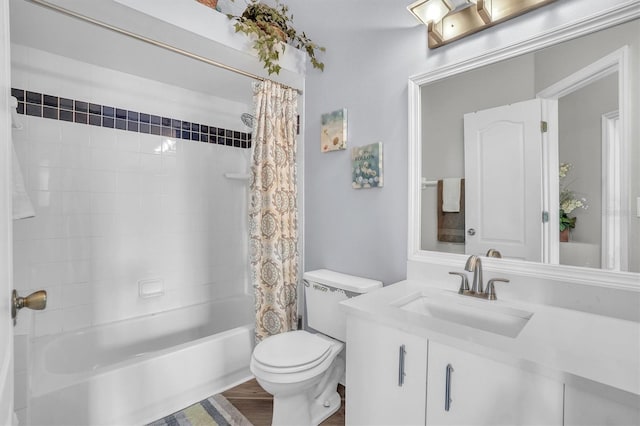 full bath with toilet, vanity, shower / bath combo with shower curtain, and wood finished floors